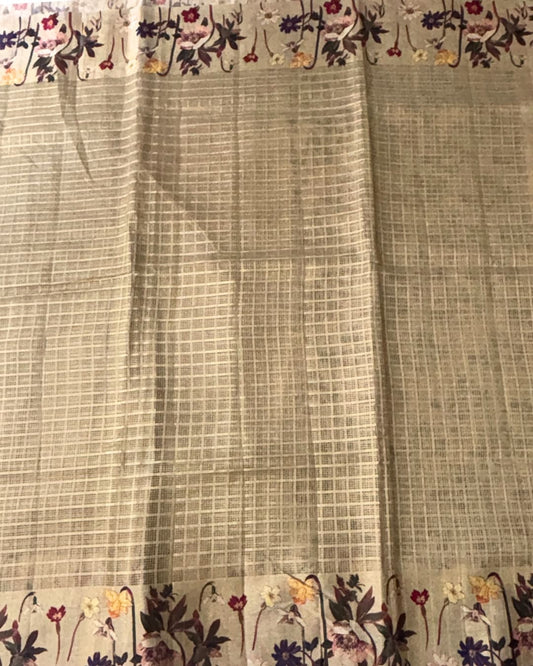Beige kota doria saree with floral border and pallu